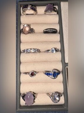 Silver tone rings set of 10 you get them all.